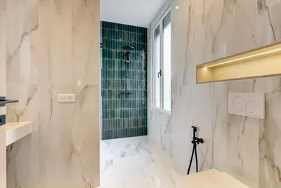 a bathroom with a shower and a toilet at Luxury Apt Cannes Croisette sea view with terrasse in Cannes