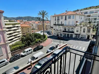a view of a city with cars parked on a street at Villa Faustina by Connexion in Cannes