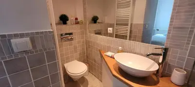 a bathroom with a sink and a toilet at Villa Olimp in Super Cannes with sea view in Le Cannet