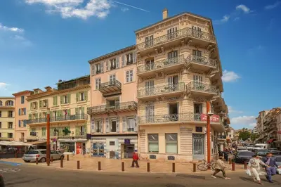 a tall building with balconies on a city street at Elégant 2 pièces vue MER, FELIX FAURE- COEUR DE CANNES A1B271 in Cannes