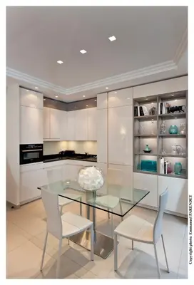 a dining room with a glass table and chairs at REF 961 - Cannes Croisette - Sea view apartment for rent in Cannes