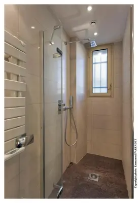 a shower with a glass door in a bathroom at REF 961 - Cannes Croisette - Sea view apartment for rent in Cannes