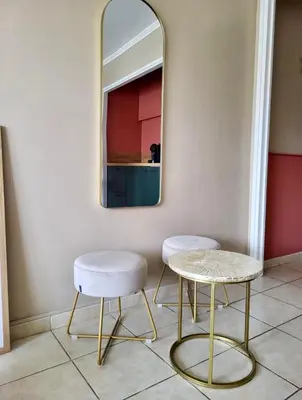 a room with two chairs and a mirror at Cannes Eden By SCLS Locations in Cannes