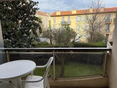 a view of a balcony with a table and a window at Studio cosy Cannes centre in Cannes