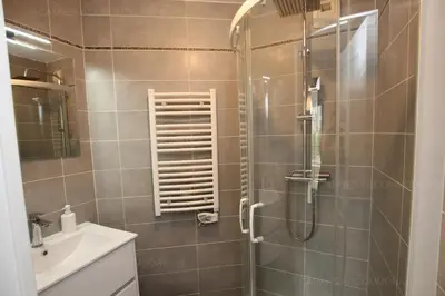 a bathroom with a shower and a sink at Paradisio in Cannes