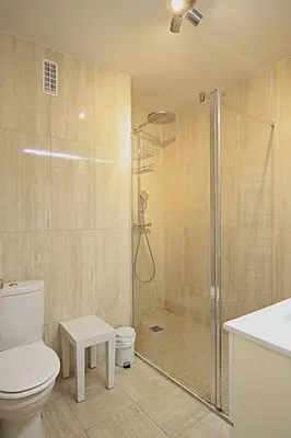 a bathroom with a shower and a toilet and a sink at Vue unique sur toute la baie de Cannes et la mer in Cannes