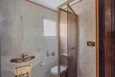 a kitchen with a sink and a microwave at Central T2 Cannes Suquet - terrasse - WIFI - Clim in Cannes