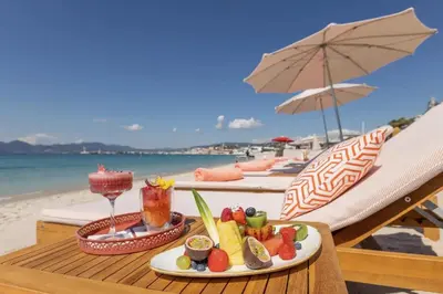 a plate of fruit on a table on the beach at CANNES - à 50m des plages et de la Croisette in Cannes