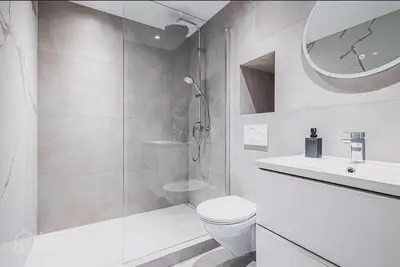 a bathroom with a shower and a toilet and a sink at 2 Pcs Plein Coeur Ville, Palace Festivals, Port Plages in Cannes