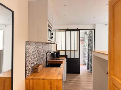 a kitchen with a sink and a counter top at CB Cannes- NEW YORK in Cannes