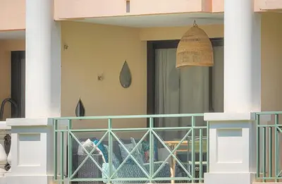 a balcony of a house with a window at Villa Francia 2P with splendid pool -private rental in Cannes