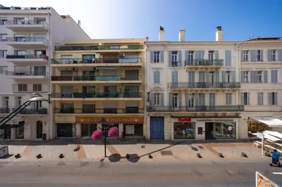 a large building with a street in front of it at Cannes 2 bedrooms apartment - 141A in Cannes