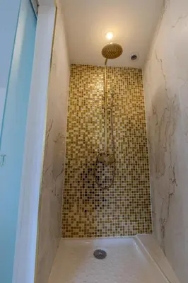 a bathroom with a shower with a shower at Renovated 1 bedroom - AC - City Center in Cannes