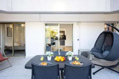 a table with food and fruit on top of it at Mimosas Lovers in Cannes