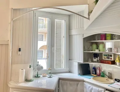 a kitchen with a sink and a window at Panter Properties-24 in Cannes