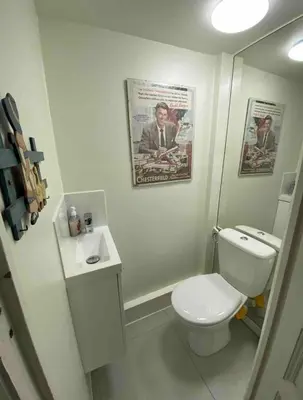 a bathroom with a white toilet and a sink at Panter Properties-24 in Cannes