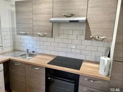 a kitchen with a sink and a counter top at Studio Cannes in Le Cannet