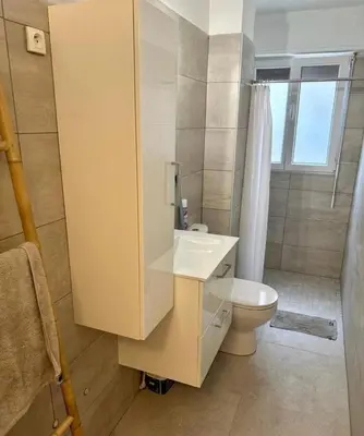 a bathroom with a toilet and a sink and a shower at Studio Cannes in Le Cannet