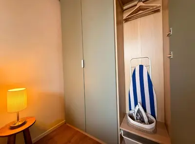 a living room with a couch and a table at Suite Tosca - Palais & Croisette 2min - Appartement Hôtel in Cannes