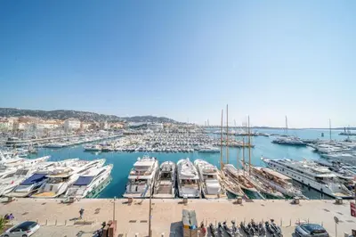 a bunch of boats docked in a harbor at REF 774 - Cannes Old Port - Sea view partment for rent in Cannes