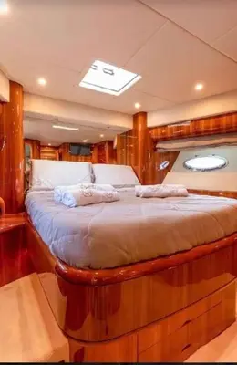 a bed in the middle of a boat at PALME Yacht - Cannes Port Canto - Pointe Croisette - Face à la Mer in Cannes