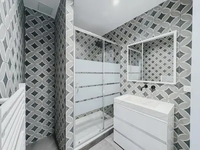 a bathroom with a white sink and a mirror at Cozy Home Cannes in Cannes