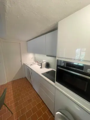 a kitchen with a sink and a microwave at Studio La Croisette Cannes La Croix d'Or 2 in Cannes