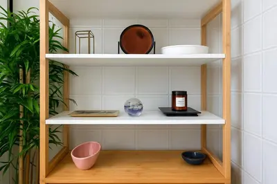 a shelf with bowls and other items on it at Apartment Center of Cannes in Cannes