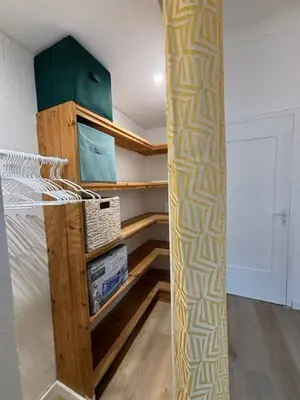 a room with a closet with a bed in it at Appartement 4 personnes à 500 mètres des plages de sable in Cannes