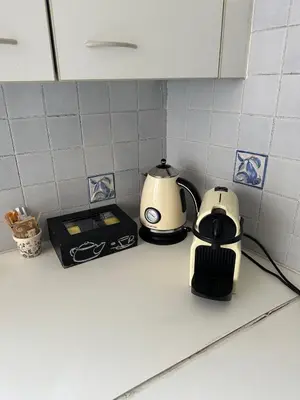 two appliances sitting on a counter in a kitchen at T3 Cannes Banane in Cannes