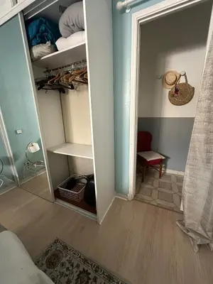 a room with a closet with a mirror in it at T3 Cannes Banane in Cannes