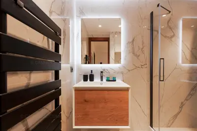 a bathroom with a sink and a shower at GRAY 3e1 in Cannes