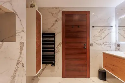 a kitchen with a large island in a room at GRAY 3e1 in Cannes