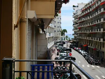 a view of a city street with parked motorcycles at Sublime apartment 100 m from the Croisette in Cannes