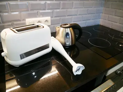 a toaster sitting on top of a kitchen counter at Sublime apartment 100 m from the Croisette in Cannes