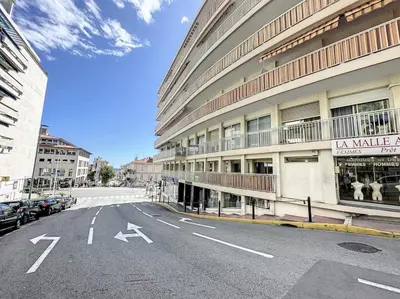 an empty street in front of a large building at Rivieira - By Coco in Cannes
