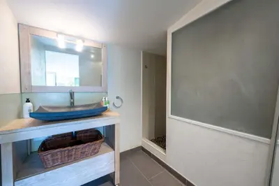 a bathroom with a sink and a mirror at 140m Villa with Pool Near Cannes in Le Cannet