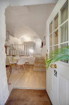 a living room with a table and some chairs at Sandra - Atypical and Charming - Suquet - VCA in Cannes