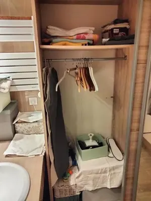a walk in closet with a shelf and a sink at Near Croisette atypic studio garden pool in Cannes