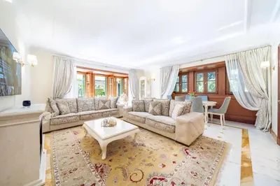 a living room with a couch and a table at Luxury apartment in Cannes in Cannes