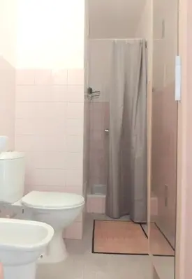 a bathroom with a toilet and a shower at Beau studio à 5 min de la plage in Cannes