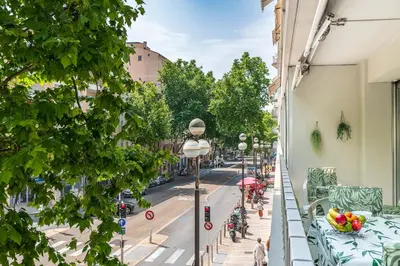 a view of a city street from a balcony at Magnifique appartement proche plages et palais in Cannes