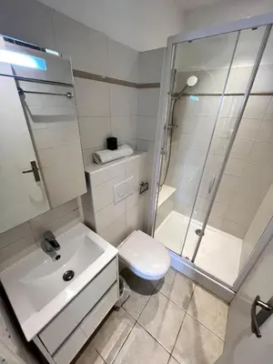 a bathroom with a shower and a toilet and a sink at T2 coeur de Cannes a 2 pas de la croisette in Cannes