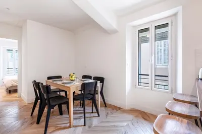 a dining room with a table and chairs at Apartment 2 bedrooms near beach - Cannes in Cannes