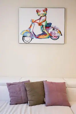 a painting of a frog riding a scooter at Notre Dame - Terrace, AC, 3mn from Palais & Beach, modern in Cannes