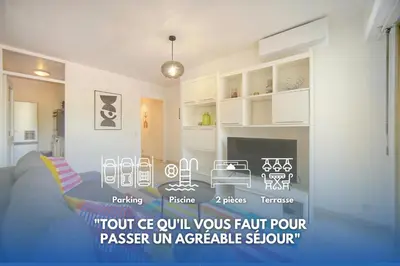 a living room with a poster of a room with furniture at Char - Piscine - Parking - VCA in Le Cannet