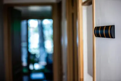 a close up of a door knob on a door at Appartement de standing, Piscine, Tennis, Plage in Cannes