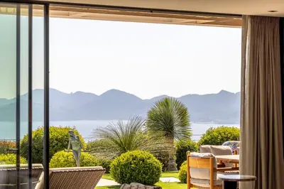 a living room with a view of the ocean at REF 2176 - Cannes -Villa panoramic sea view in Cannes
