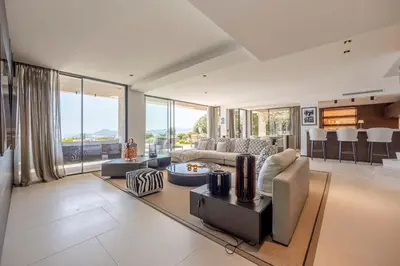 a living room with a couch and a table at REF 2176 - Cannes -Villa panoramic sea view in Cannes