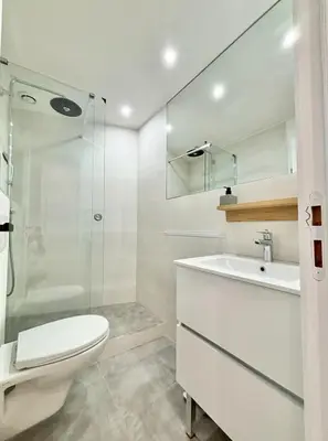 a bathroom with a toilet and a sink and a shower at Cannes 1 bedroom apartment - FC8 in Cannes